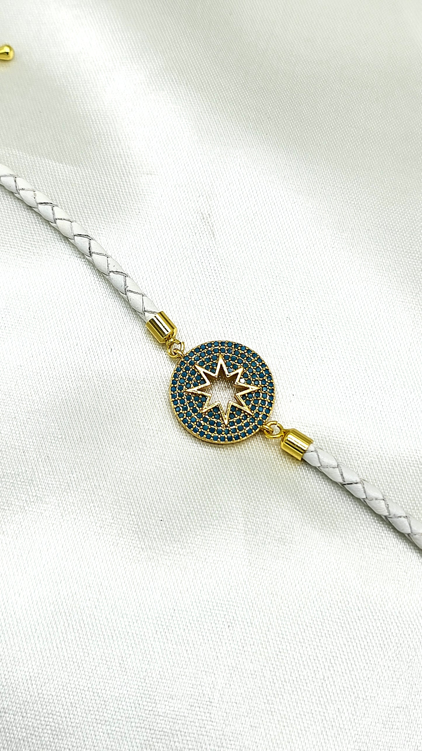 North Star CZ Rakhi on White Braided Cord