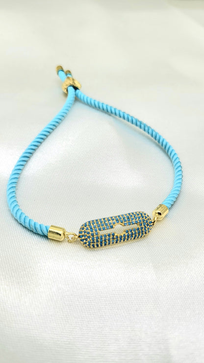 Contemporary Blue CZ Rakhi on Twisted Cord