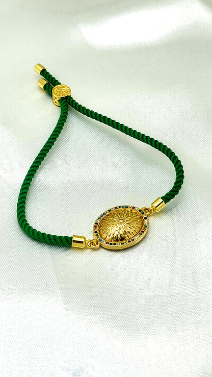 Royal Emblem Rakhi with Multicolor Accents – Green Cord
