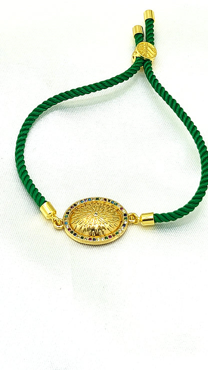 Royal Emblem Rakhi with Multicolor Accents – Green Cord