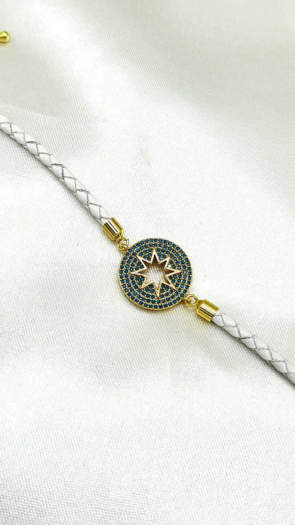North Star CZ Rakhi on White Braided Cord