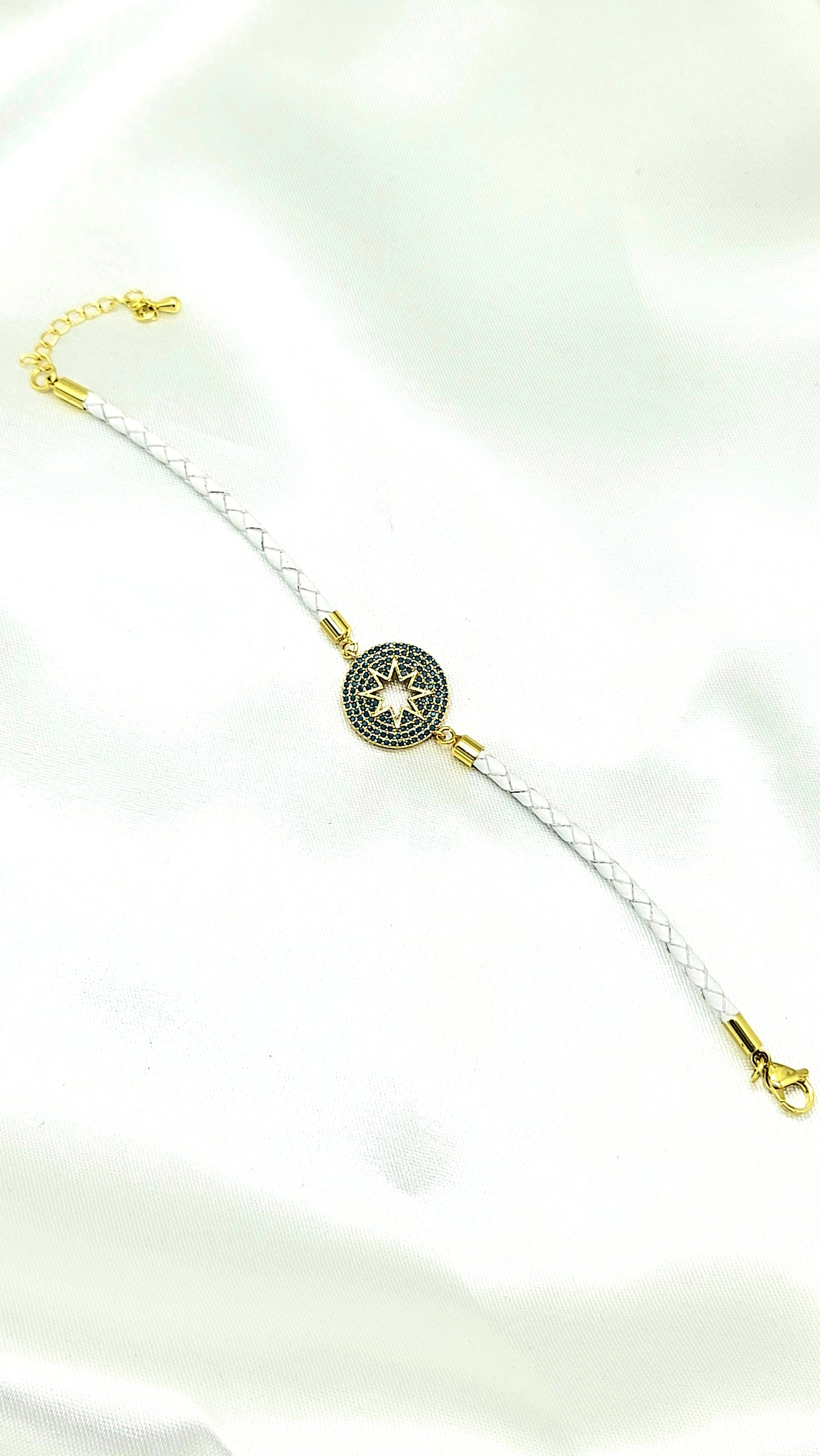 North Star CZ Rakhi on White Braided Cord