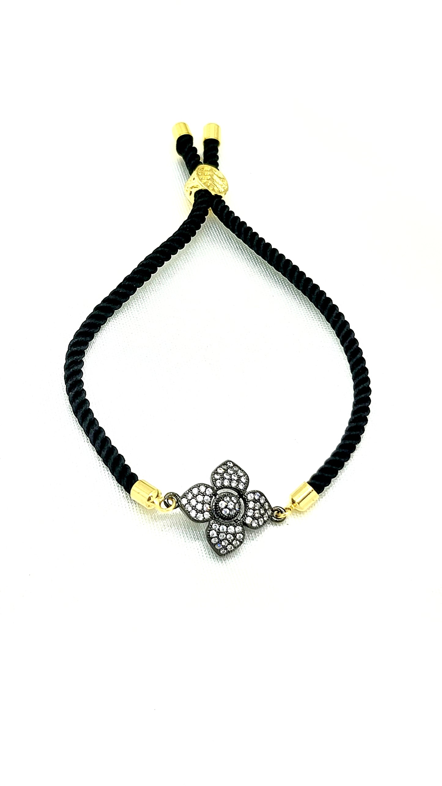 Elegant Black Rakhi with Sparkling CZ Flower