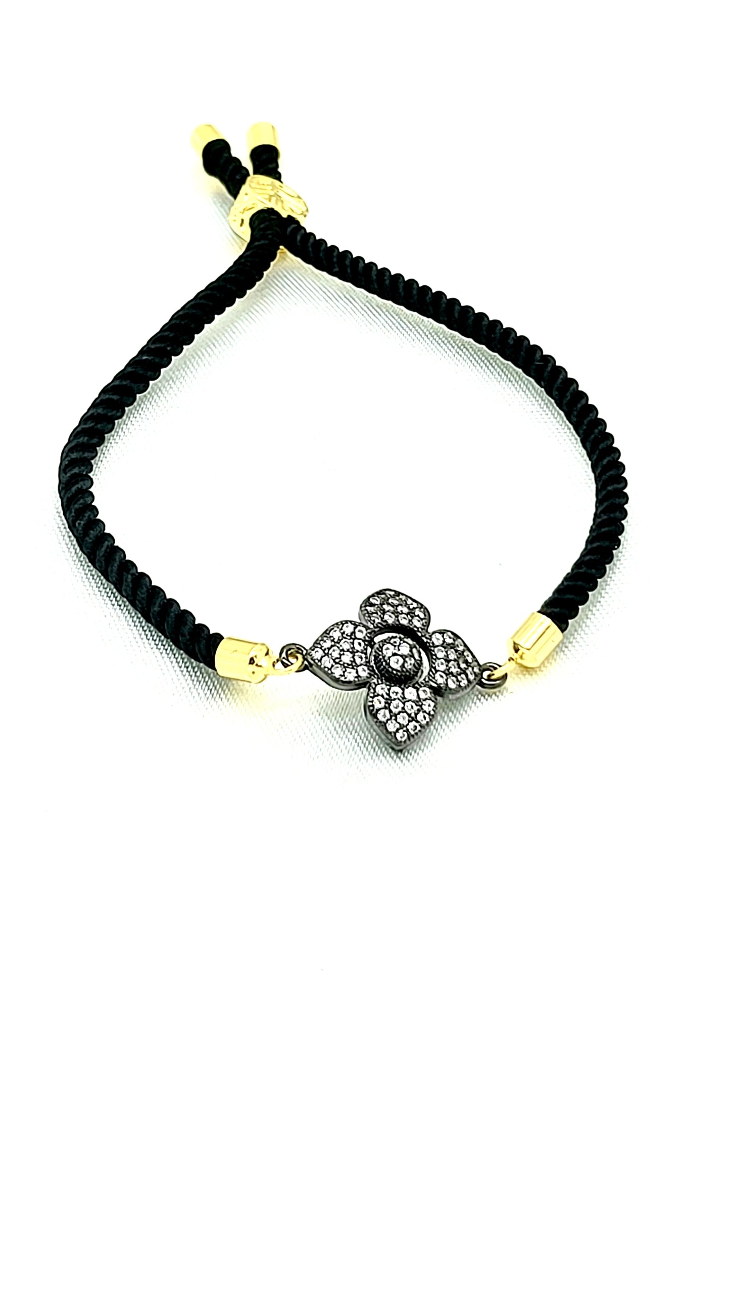 Elegant Black Rakhi with Sparkling CZ Flower