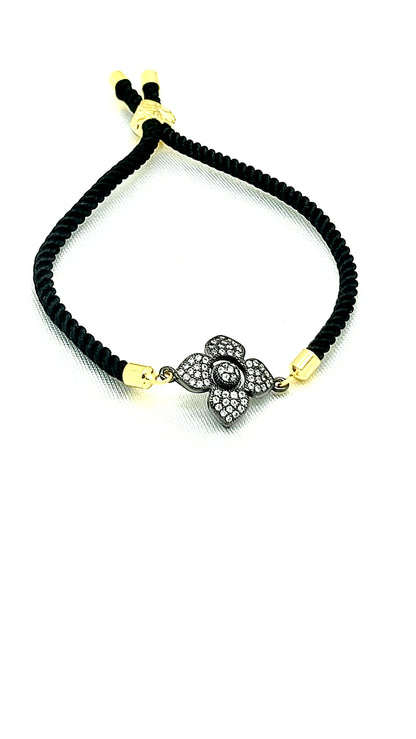 Elegant Black Rakhi with Sparkling CZ Flower