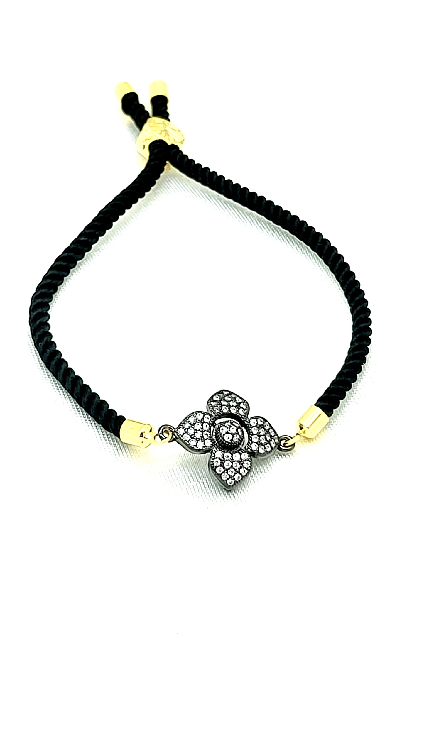 Elegant Black Rakhi with Sparkling CZ Flower