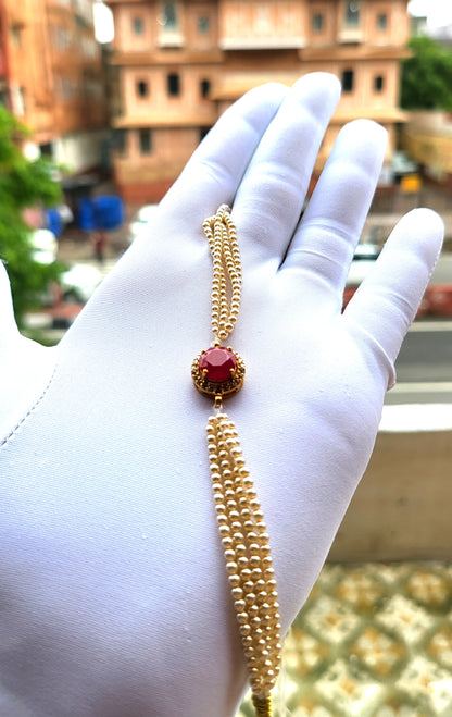 Red Stone Centerpiece Pearl Strand Bracelet