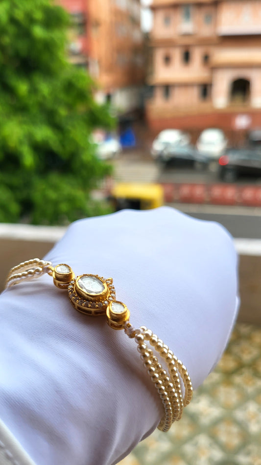 The Meher Bracelet – Triple Polki Charm with Layered Pearl Strands