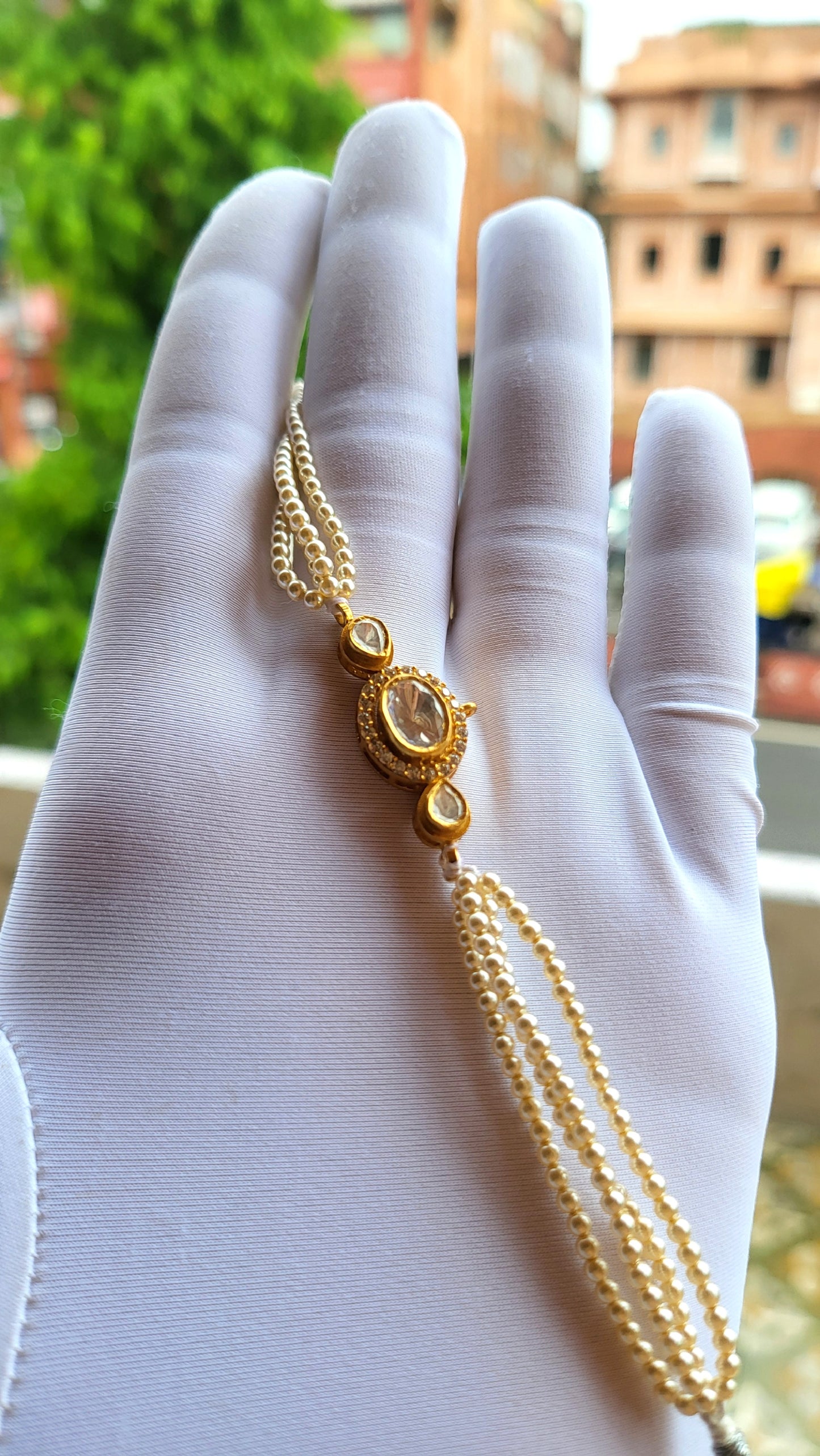 The Meher Bracelet – Triple Polki Charm with Layered Pearl Strands