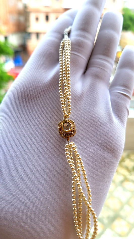 The Aarohi Bracelet – Cushion-Cut Moissanite Polki with Triple Swarovski Pearl Strands