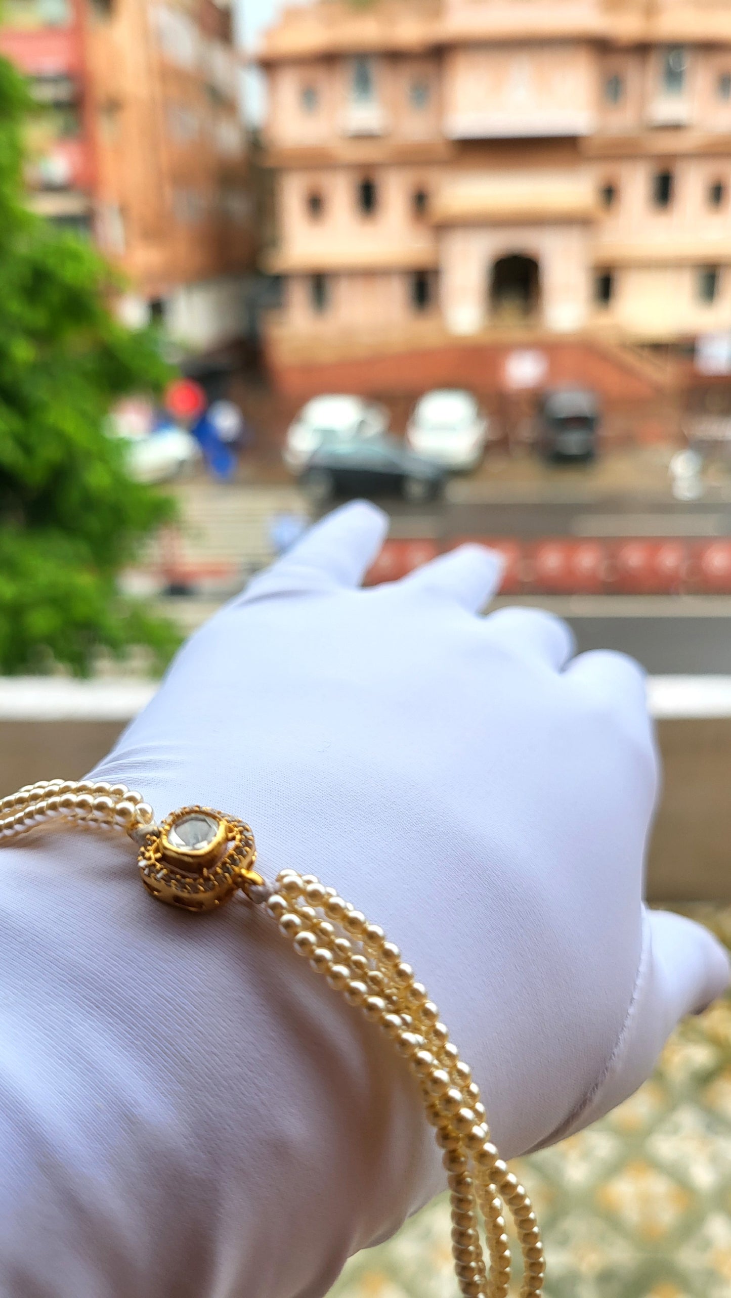 The Aarohi Bracelet – Cushion-Cut Moissanite Polki with Triple Swarovski Pearl Strands